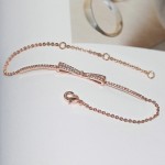 Minimalist Rose Gold CZ Wing and Bow Charm Bracelet for Women